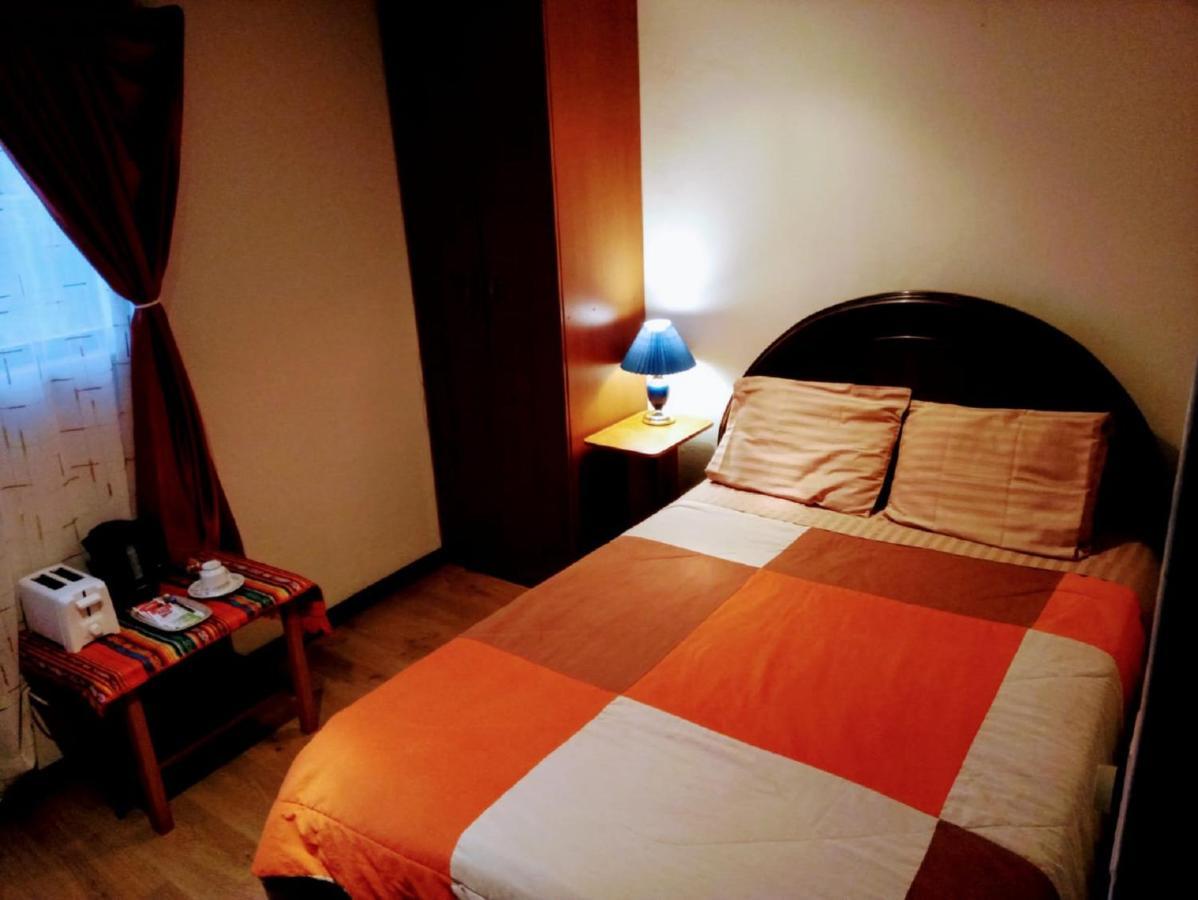Casa De Huespedes Tu Parada En Куенка Екстер'єр фото